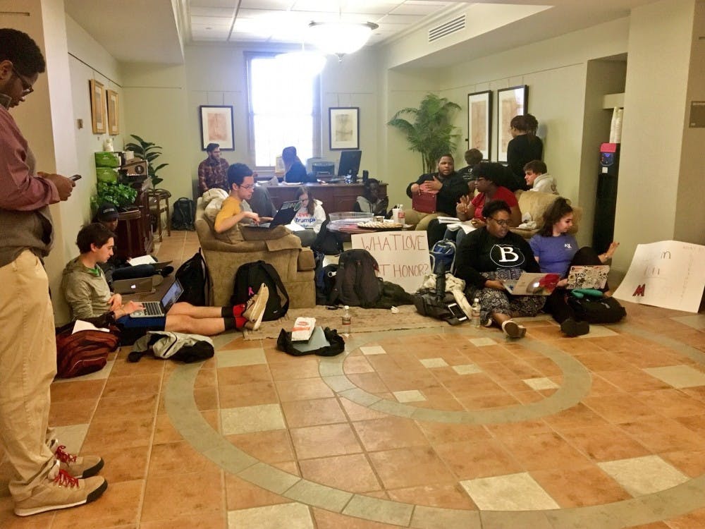 Black students and allies stage a sit-in at Roudebush Hall.