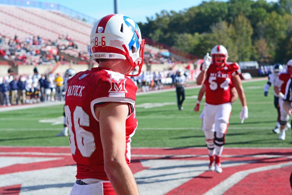 Redshirt senior wide receiver Luke Mayock donned a blue ribbon last season. This year&#x27;s version of the helmets features the Miami &quot;M&quot; instead of the school name.
