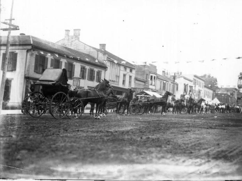 Horses and carriages at the Oxford Street Fair on High Street, circa 1913.