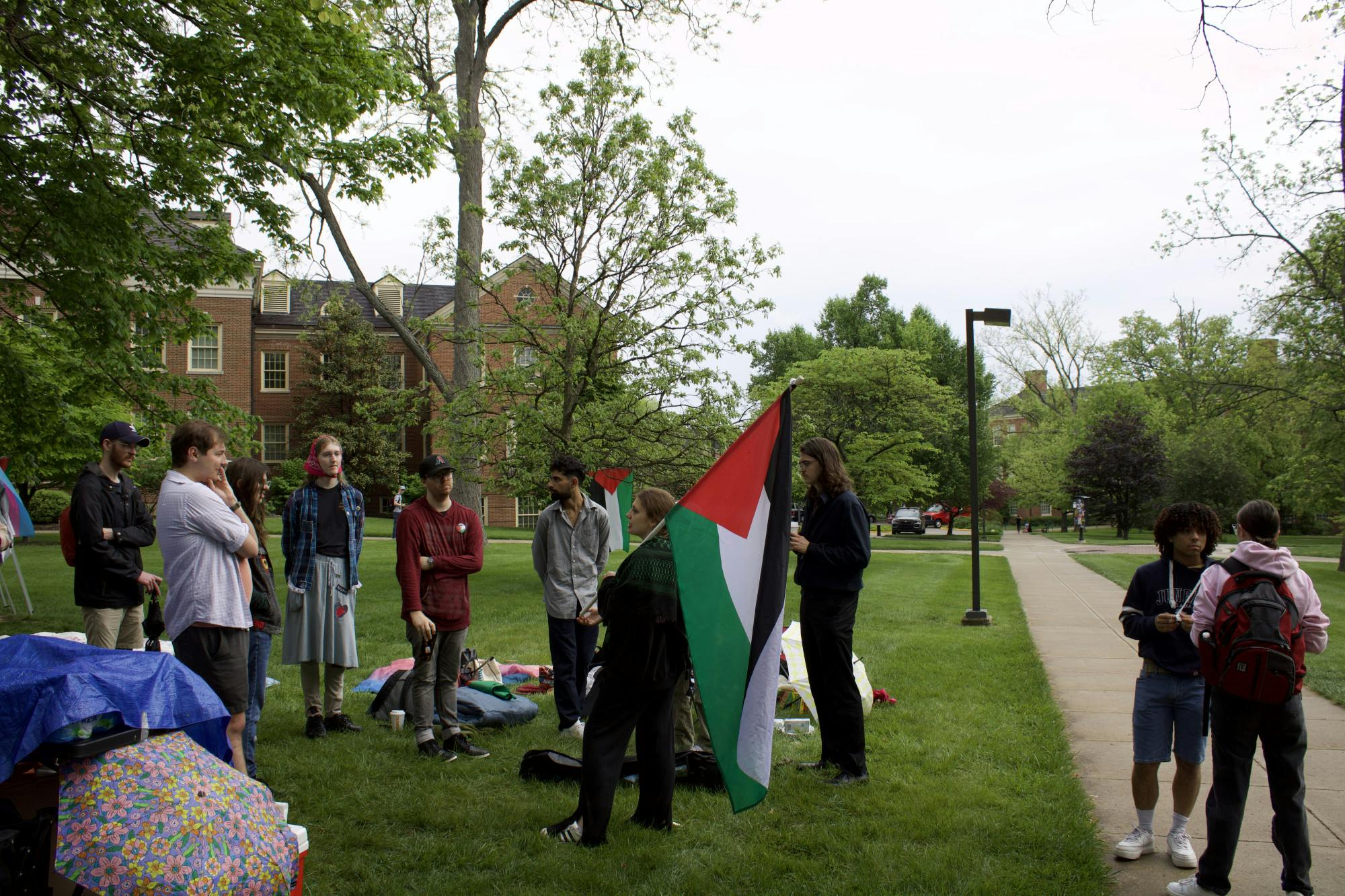 Protesters were unable to keep a canopy tent up after administrators said it was against student organization policy.