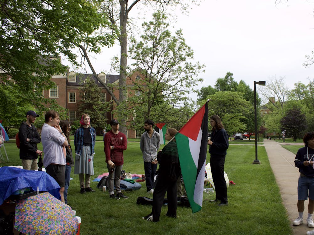 Protesters were unable to keep a canopy tent up after administrators said it was against student organization policy.