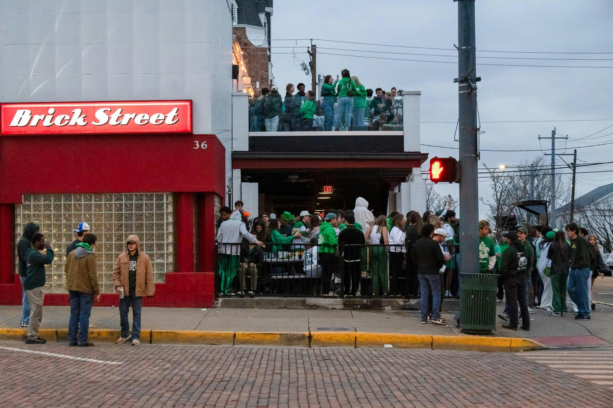 Dozens of students gather at Brick Street Bar to celebrate Green Beer Day 2025. 