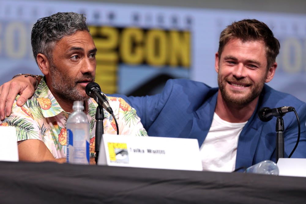 Taika Waititi (left) returned to the MCU to direct Thor: Love and Thunder, starring Chris Hemsworth (right), but the movie doesn't live up to the pair's previous work together.
