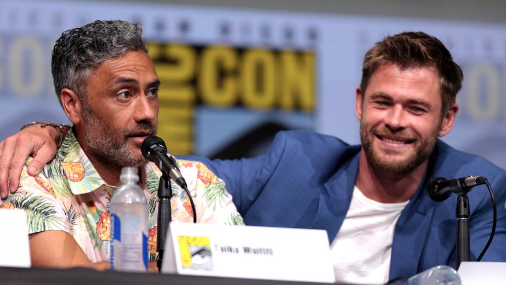 Taika Waititi (left) returned to the MCU to direct Thor: Love and Thunder, starring Chris Hemsworth (right), but the movie doesn't live up to the pair's previous work together.