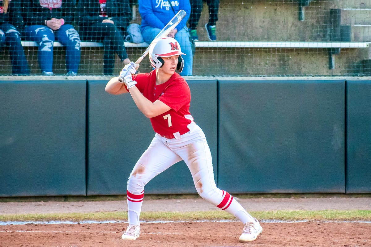 Senior softball player Karli Spaid steps up to bat at a Miami University softball game. 