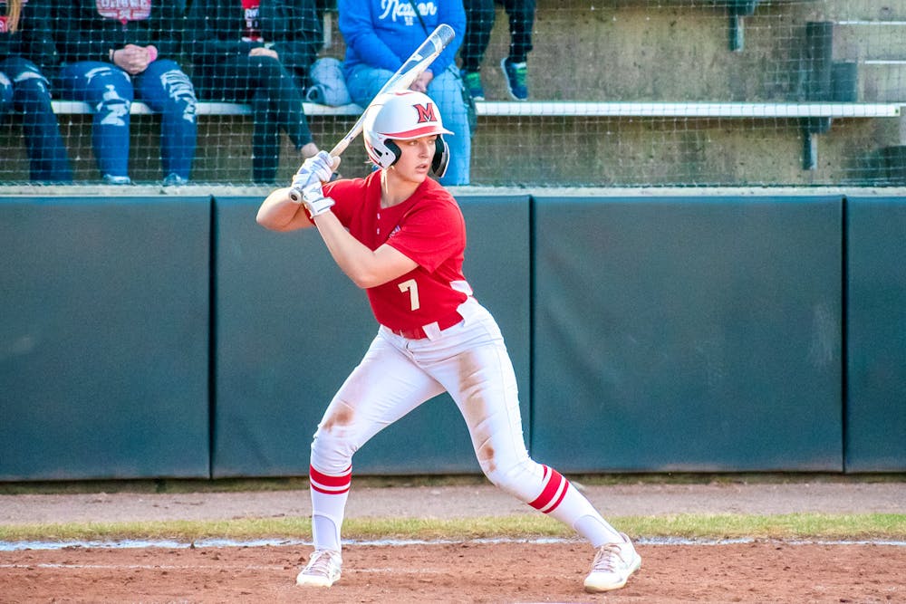 <p>Senior softball player Karli Spaid steps up to bat at a Miami University softball game. </p>