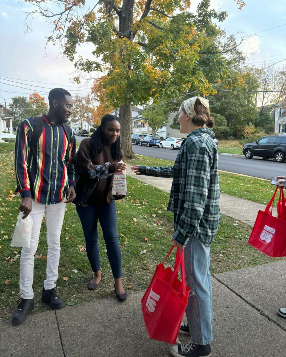 <p>H.A.W.K.S. Peer Health Educators give out goodie bags filled with life saving products for Halloween. </p>