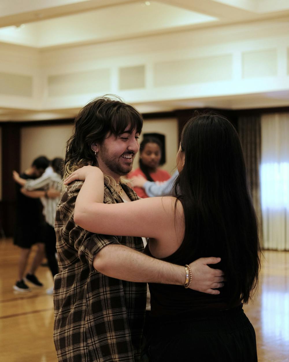 Miamians and community members enjoy learning Salsa and Bachata in Shriver Center's Heritage Room. Photo by Ian Do