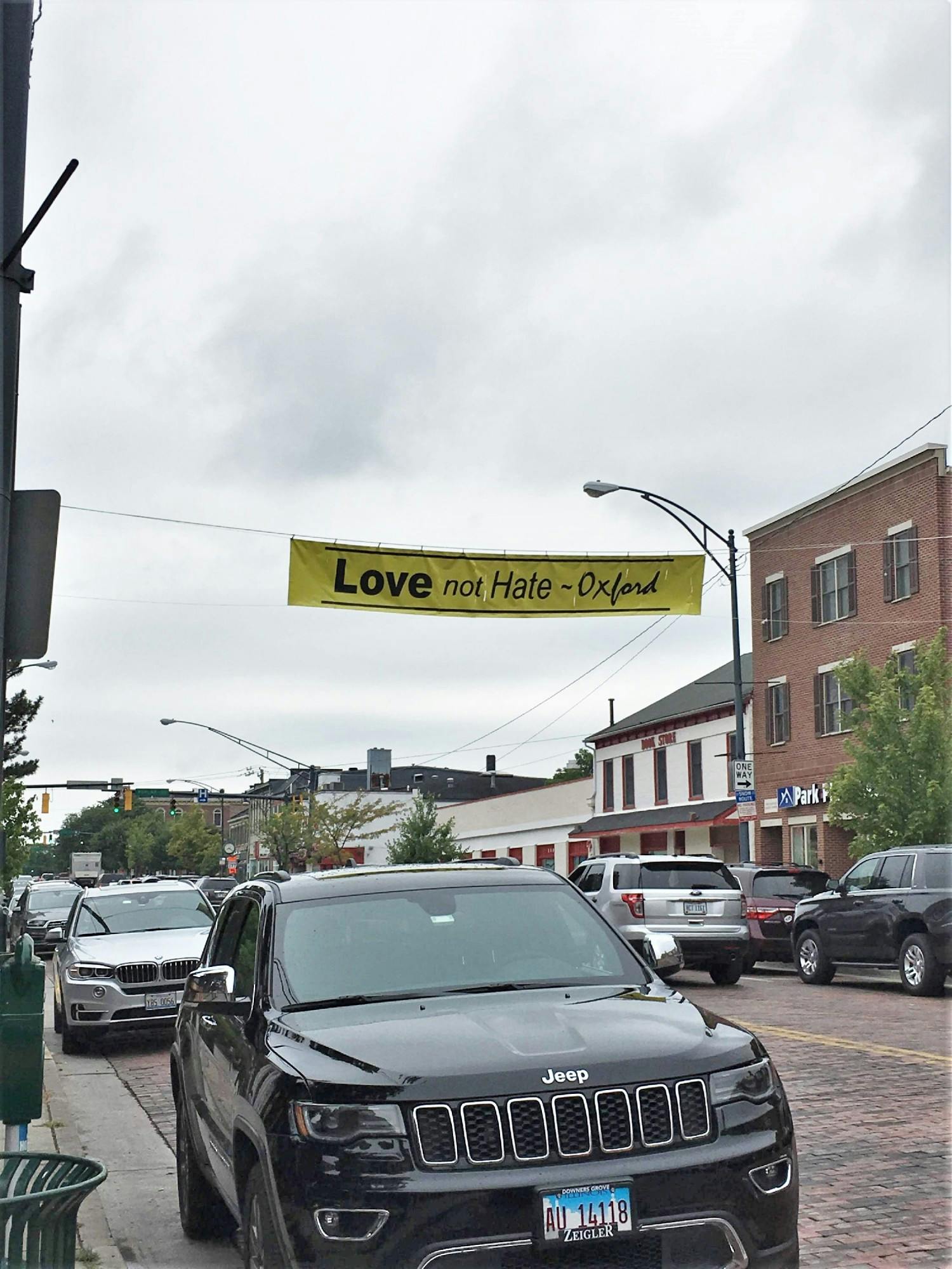 &quot;Defending Democracy&quot; hung a banner Uptown after the recent anti-Asian violence.
