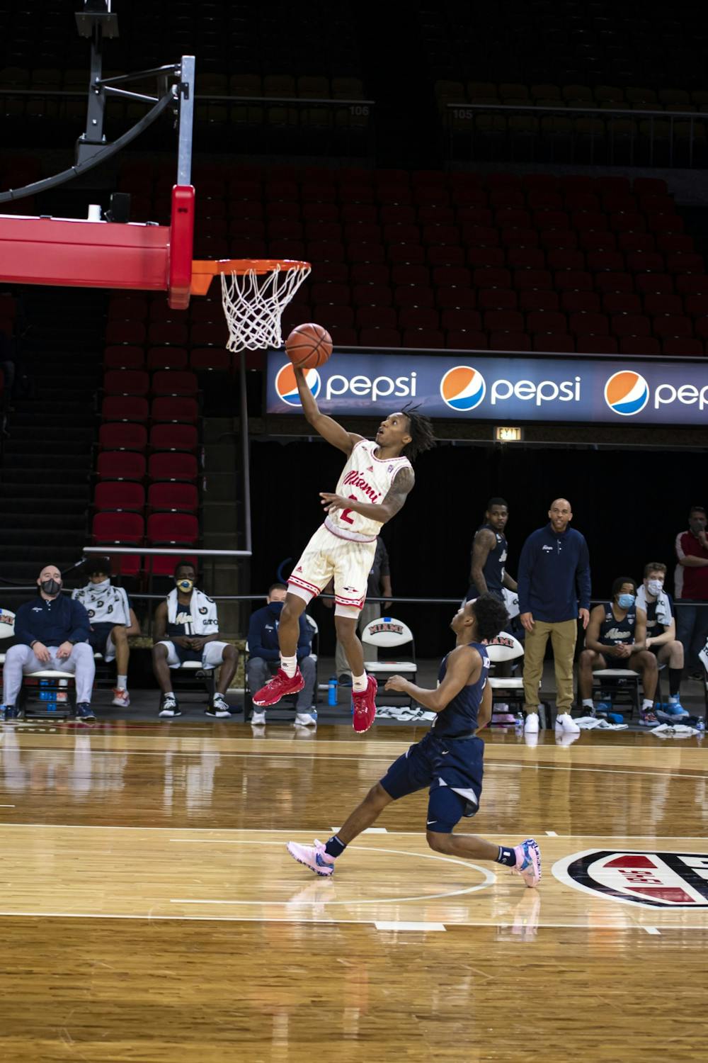 <p>Junior guard Mekhi Lairy attempts a layup during a Feb 12 loss to Akron.</p>