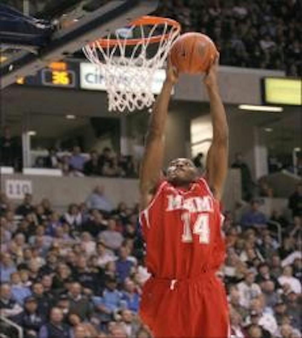 Senior Kenny Hays reaches for a dunk against the No. 16 Xavier Musketeers Nov. 29. The RedHawks bring their exciting play to Millett Hall for their home opener Saturday.