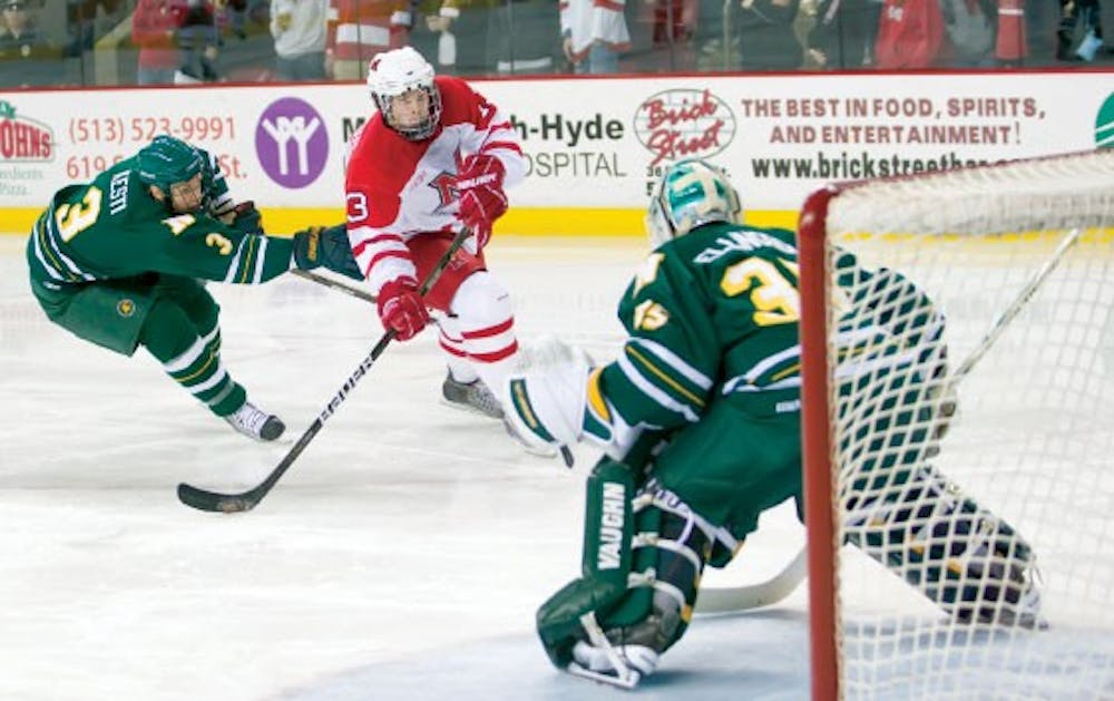 Trent Vogelhuber notches one of his two goals for the Red and White in their game against Northern Michigan University Oct. 23. 