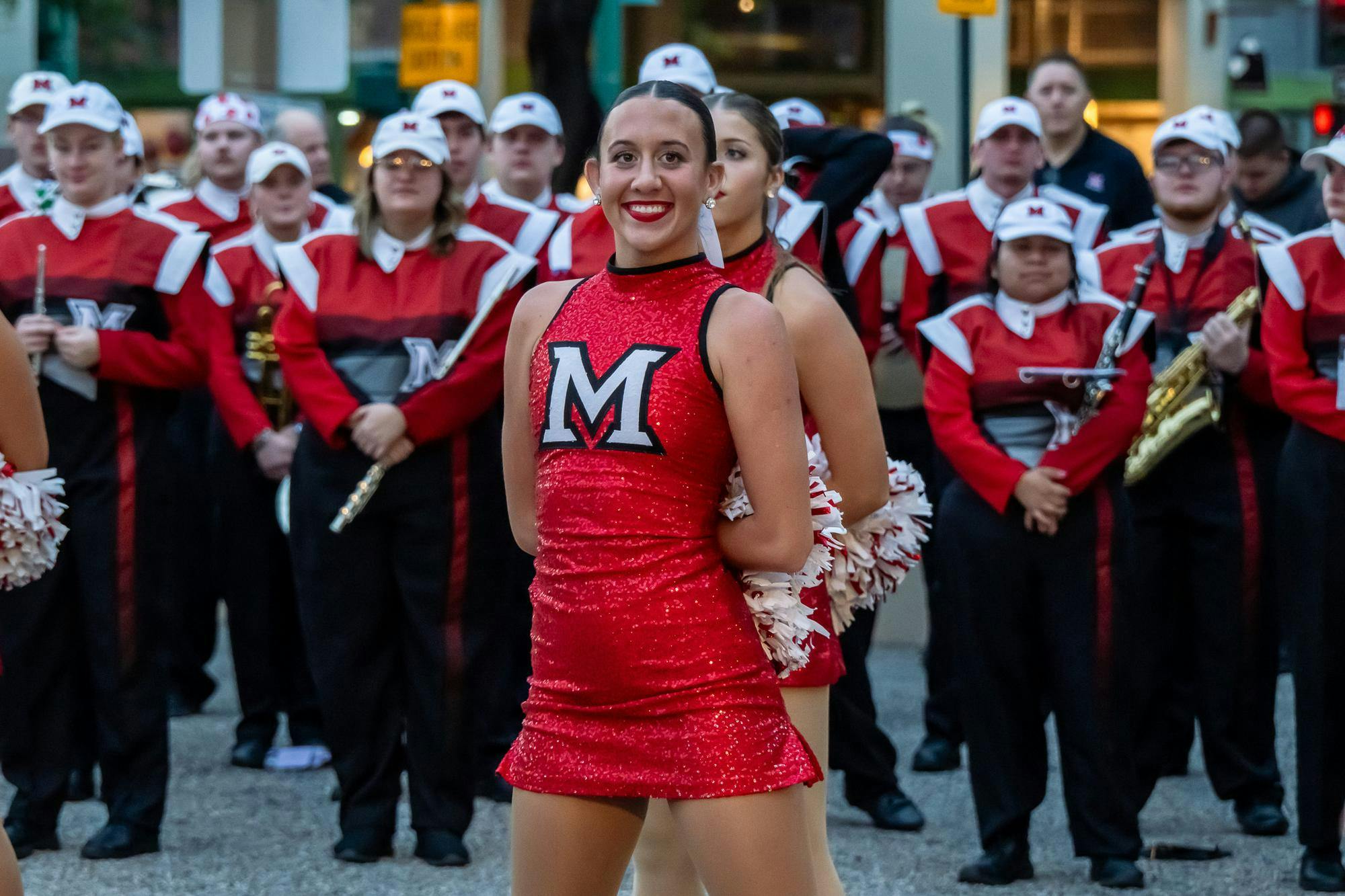 Ally Winter, senior communication captain on the Miami University Shakerettes, waits for her team's performance during the Snoop Dogg Arizona Bowl Pep Rally on Dec. 26.