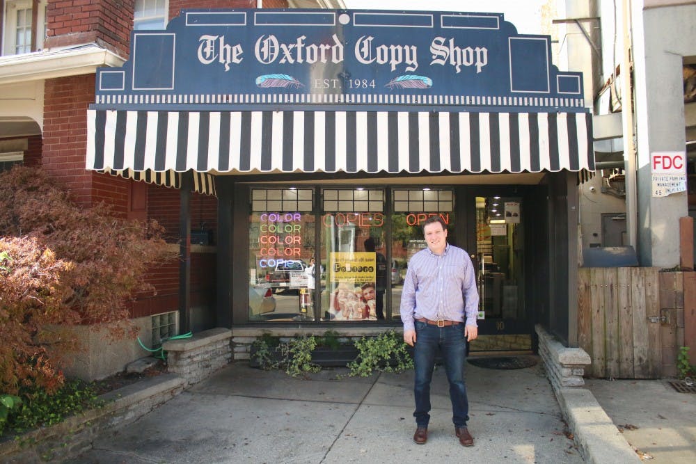 The Oxford Copy Shop and its manager, Matt Rupel.