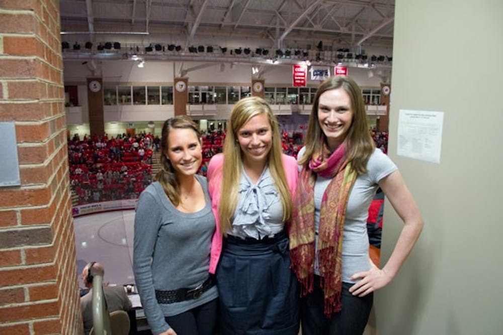 Your reporting crew at The Miami Student, from left to right, sports editor Katie Giovinale, editor in chief Catherine Couretas, and hockey beat reporter Erika Hadley.