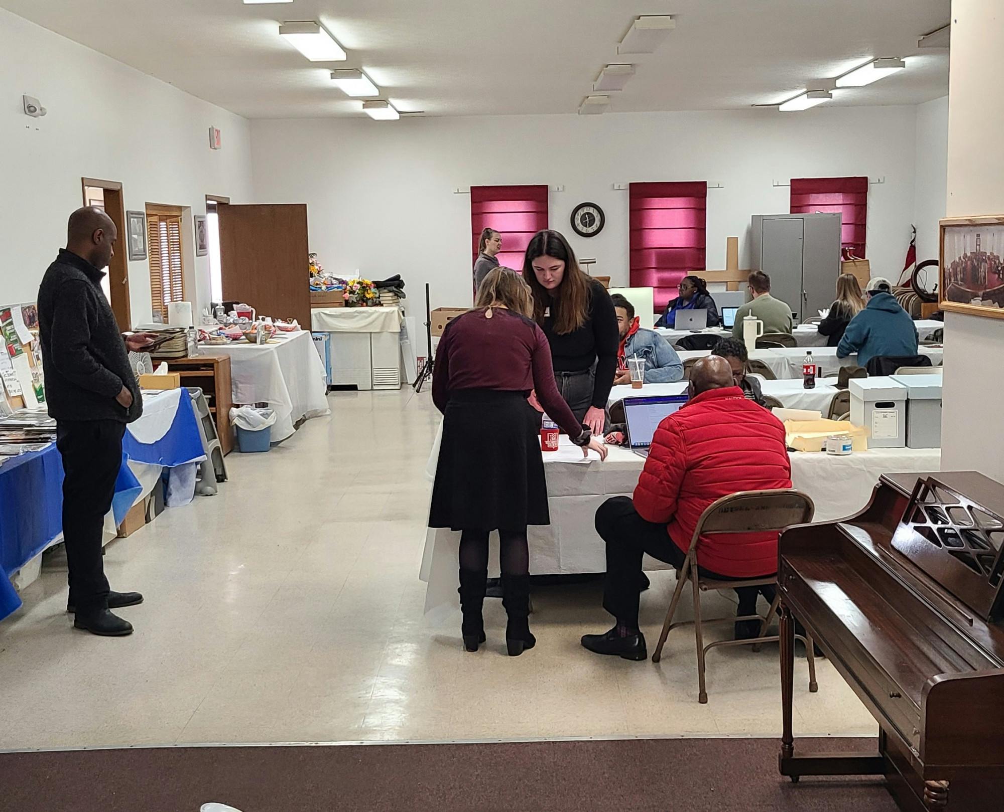 Members of the community gather to digitize documents and celebrate a shared past.