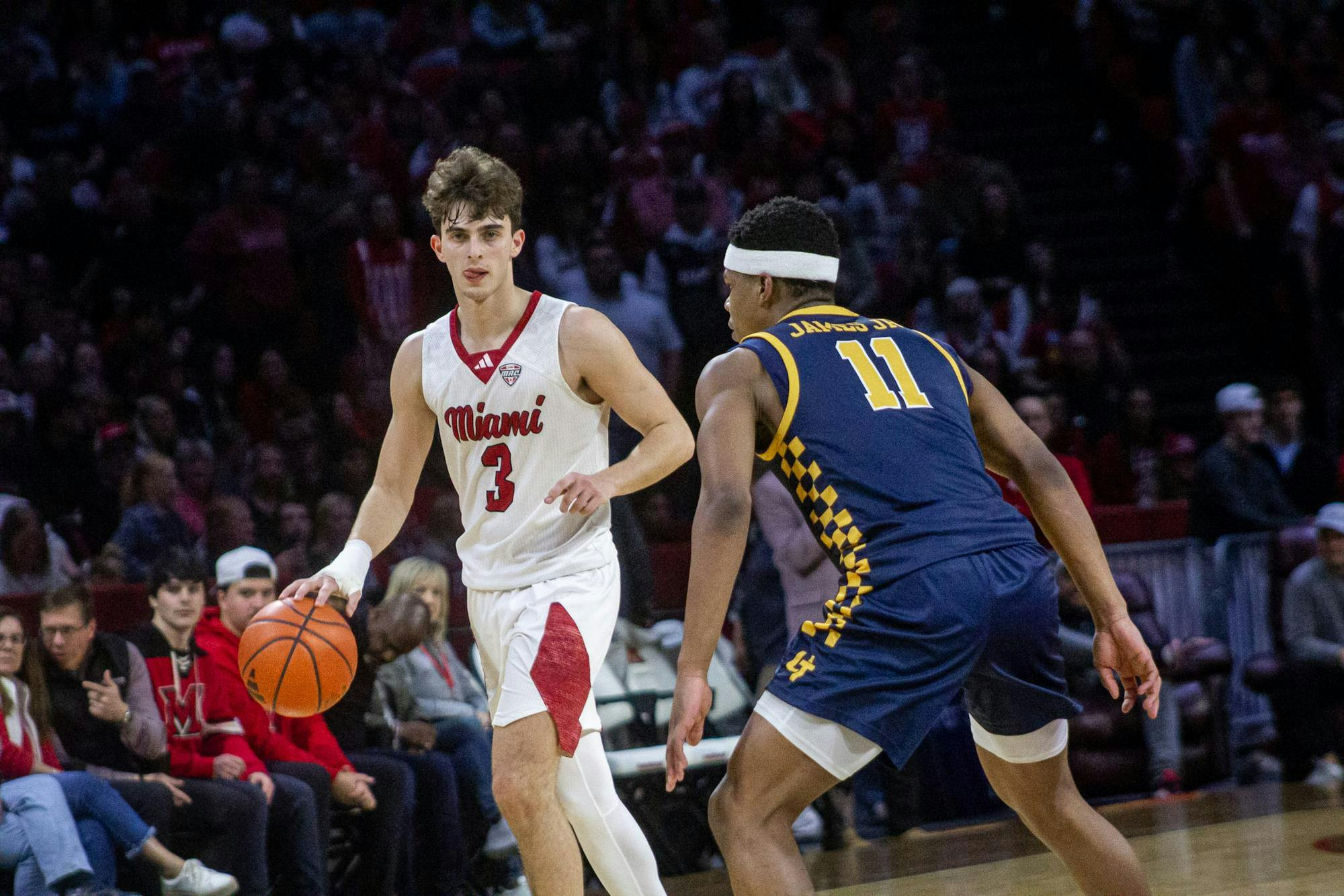 Luke Skaljac dribbles ball on offense in game against Toledo.