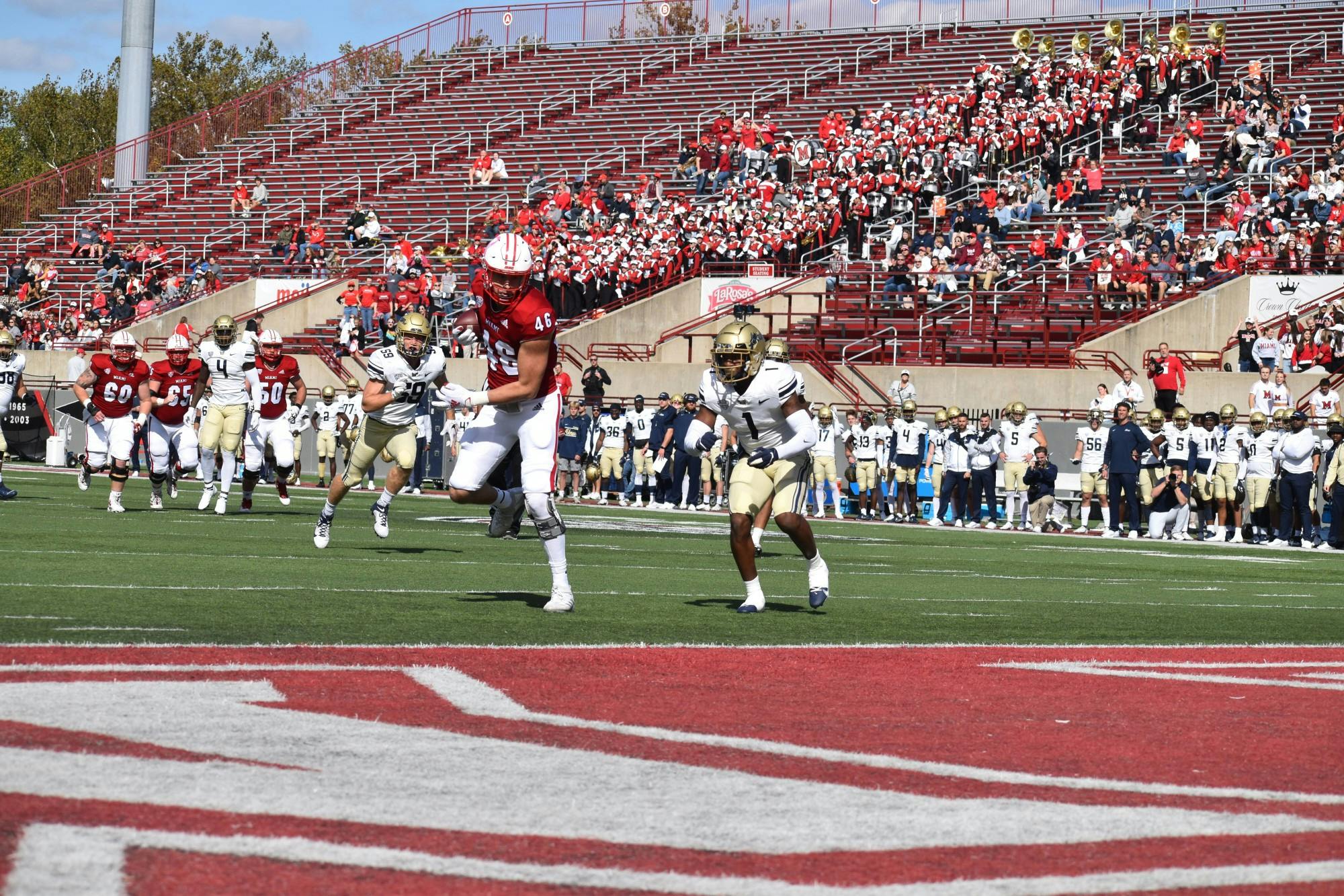 Senior tight end Andrew Homer collects one of his two touchdown grabs in an Oct. 16 win over Akron.