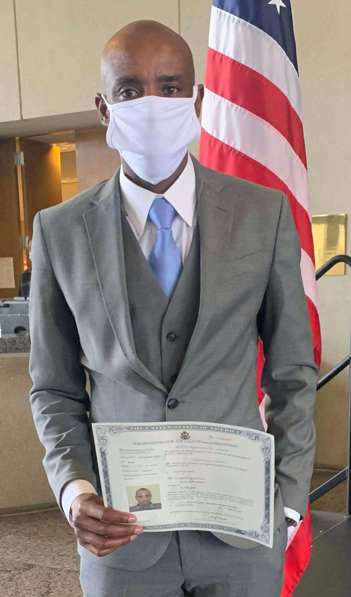 Miami journalism major Godwin Agaba became an American citizen after fleeing Rwanda years ago.