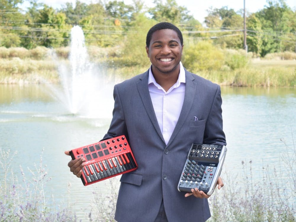 As a sophomore, Emmanuel "Manny" Addams balances being a full-time student and managing his own music production company.