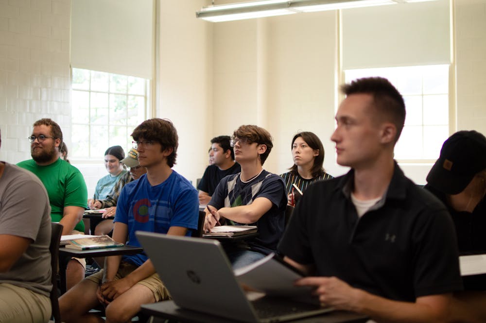 Students in Elena Albarran’s class listen to a lecture about the Cuban Revolution.