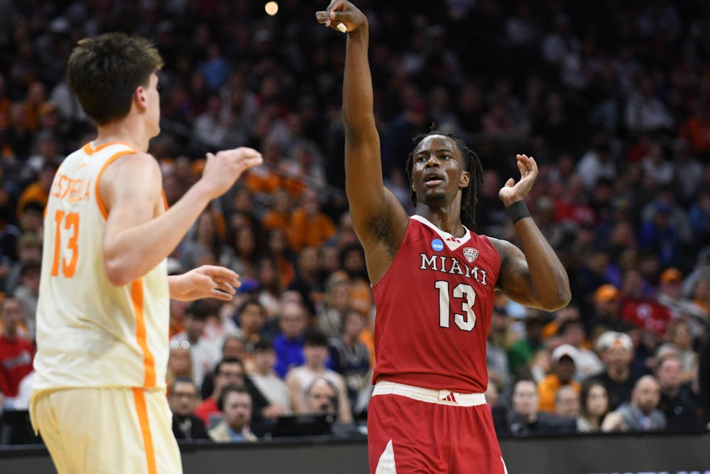Senior forward Antwone Woolfolk watches his 3-point attempt against Tennessee at Xfinity Mobile Arena in Philadelphia on March 20