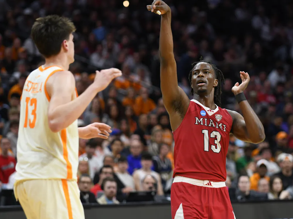 Senior forward Antwone Woolfolk watches his 3-point attempt against Tennessee at Xfinity Mobile Arena in Philadelphia on March 20