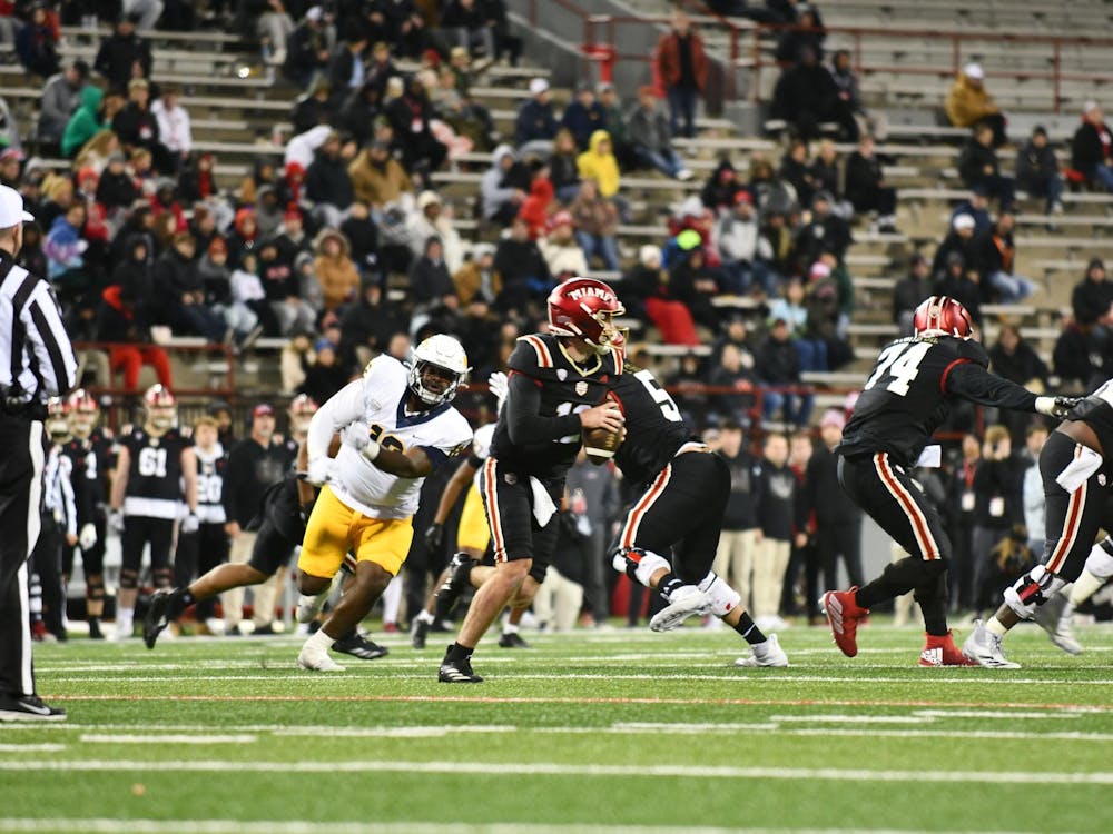 Redshirt senior quarterback Henry Hesson steps back in the pocket looking to pass against Toledo at Yager Stadium on Nov. 12