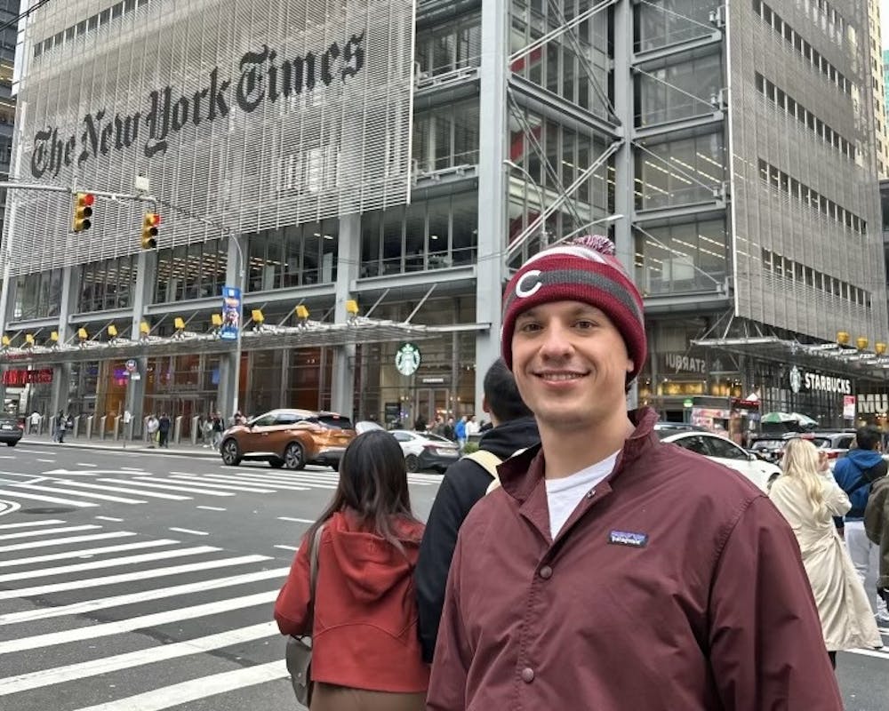 Jack Schmelzinger stands in front of The New York Times building. This guy wrote a book while in college. Damn.