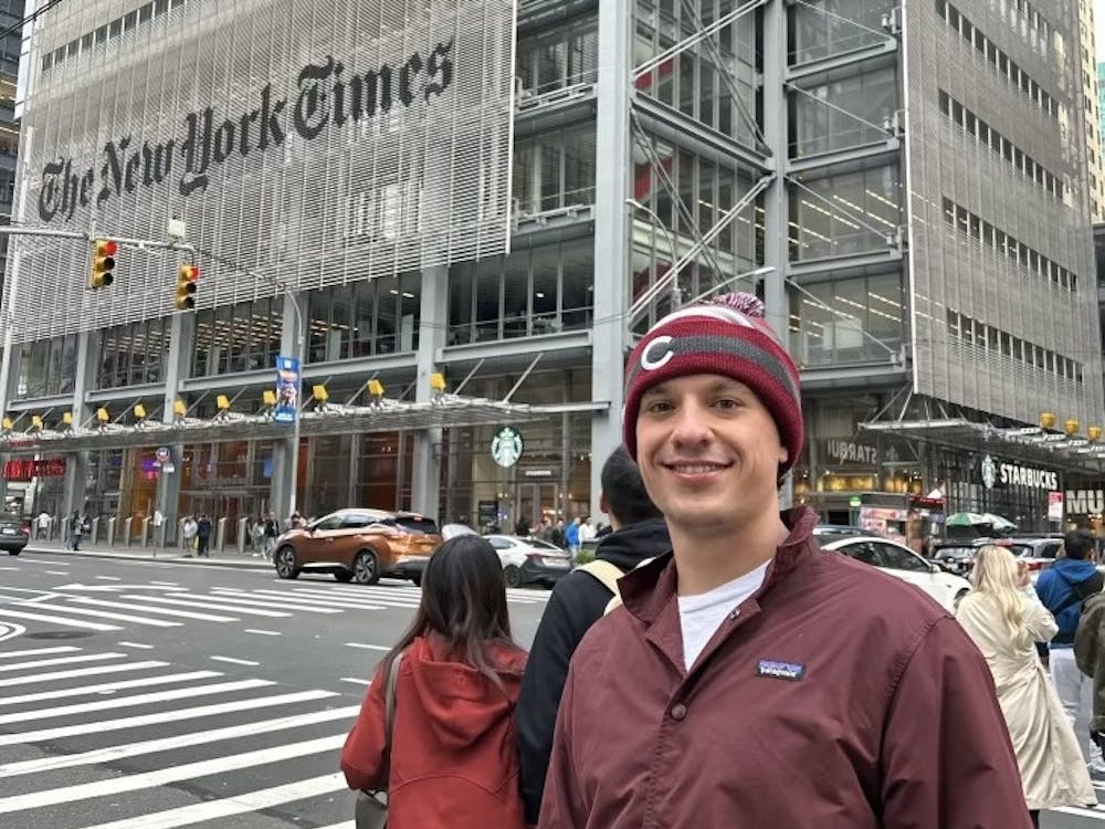 Jack Schmelzinger stands in front of The New York Times building. This guy wrote a book while in college. Damn.