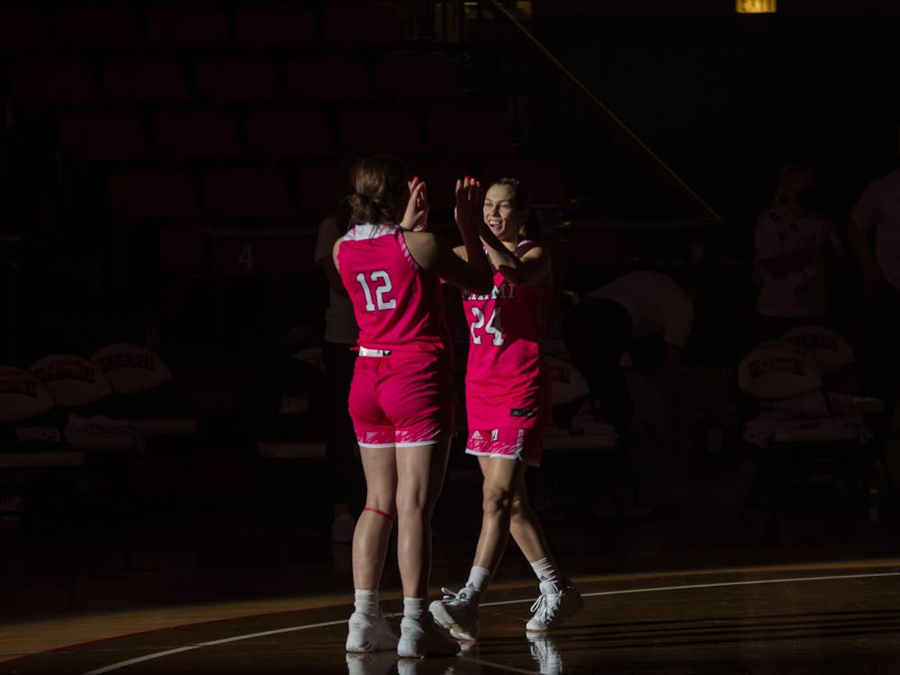 Sophomore guard Peyton Scott (pictured, right) made a 3-point buzzer beater to beat Kent State, 61-58.