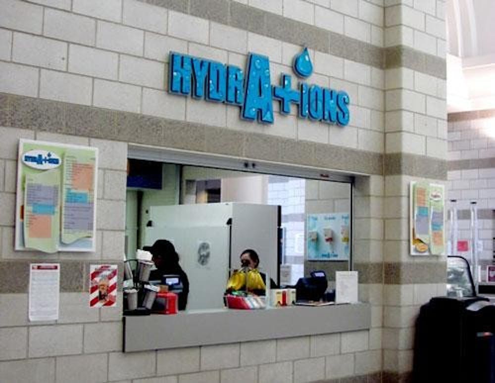 Students work at Hydrations, located in the lobby of the Recreational Sports Center. The dining facility will likely close at the end of the school year due to a number of factors including low sales and remodeling plans.