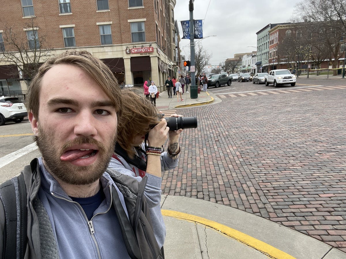 Goofy as ever, Luke stuck his tongue out while Devin’s hair ruined yet another photo.