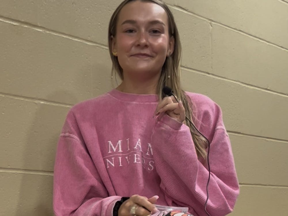 Tincher records a "What's in my Makeup Bag" video.