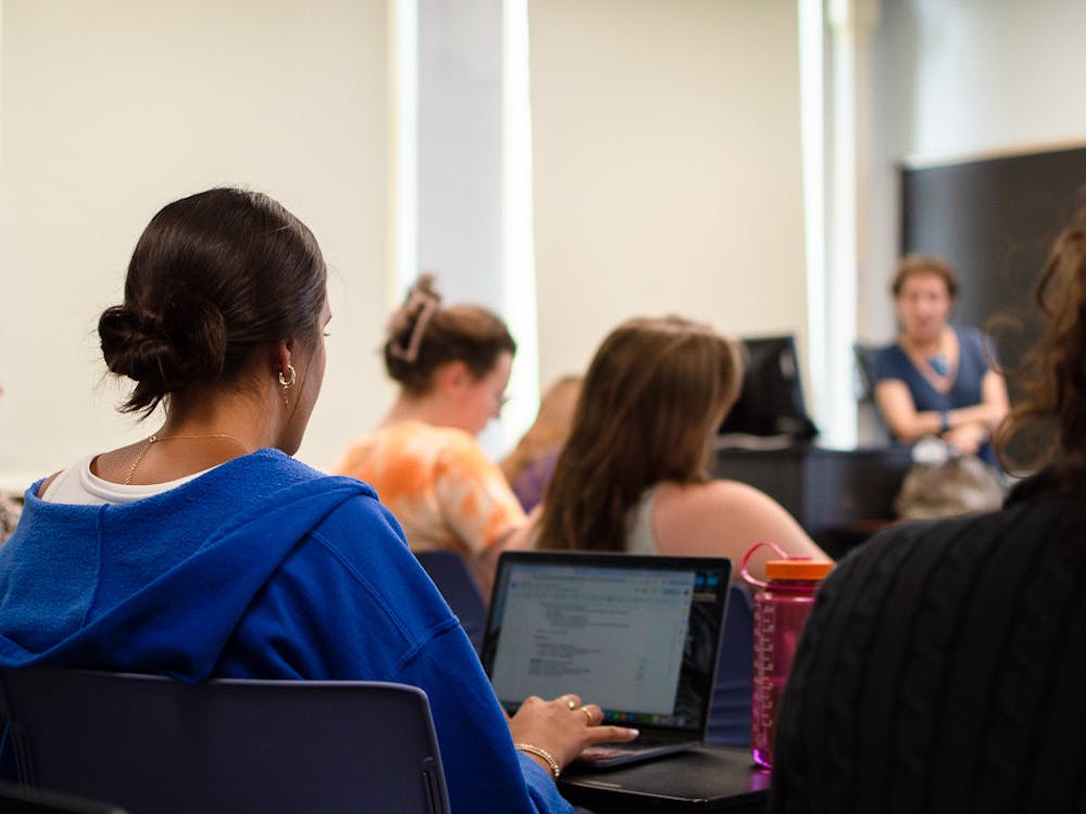 Students in Dr. Deborah Lyons' CLS 210 class discuss their reading on ancient religions.