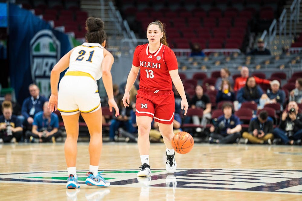 Sophomore guard Tamar Singer dribbles against Kent State during last season's MAC tournament at Rocket Mortgage Arena