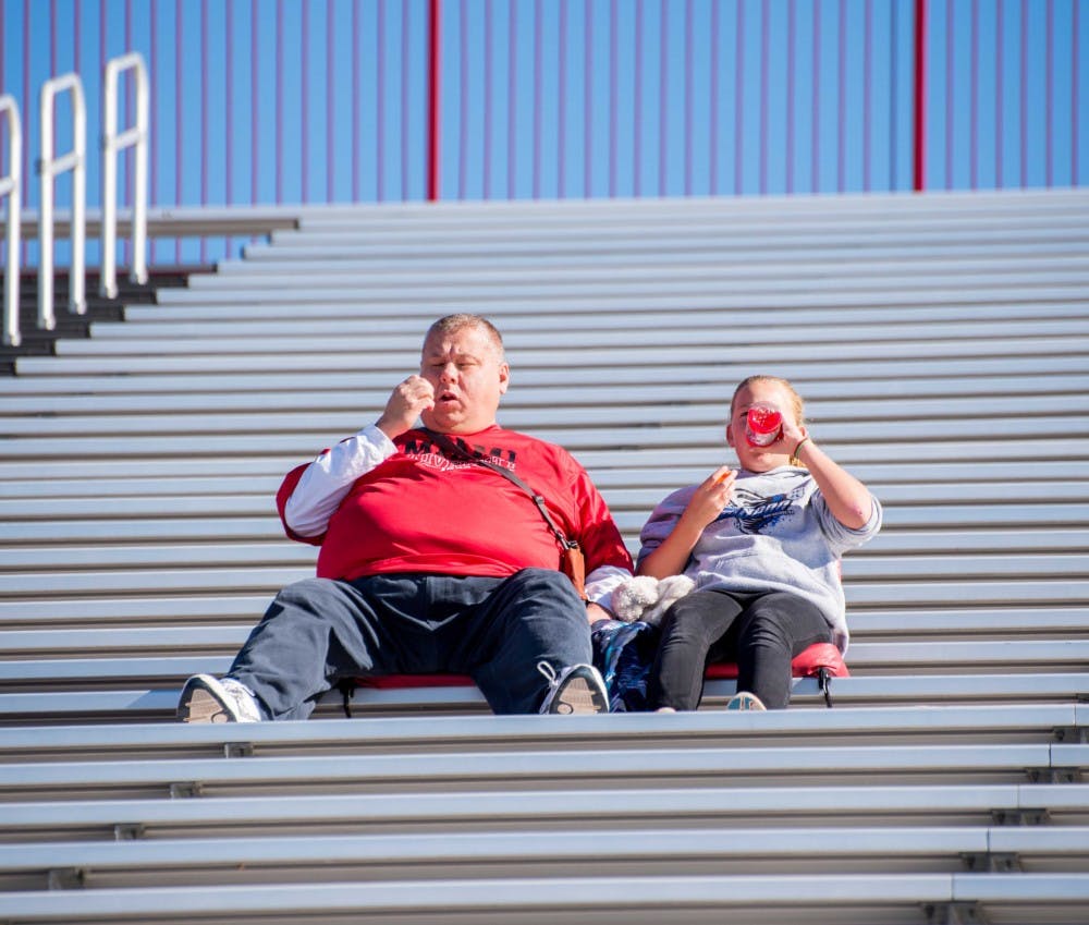 Fans take in a Miami football game at Yager Stadium