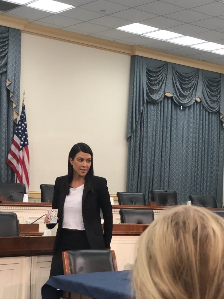 Kourtney Kardashian attends a briefing on Capitol Hall.
