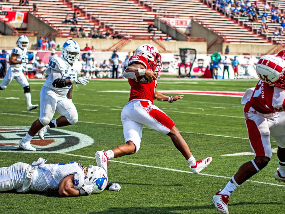 Junior running back Jaylon Bester carries the ball against the Buffalo Bulls on Sept. 28, 2019.