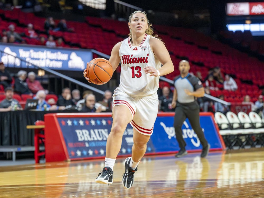 Sophomore guard Tamar Singer dribbles against Toledo at Millett Hall on Jan. 3