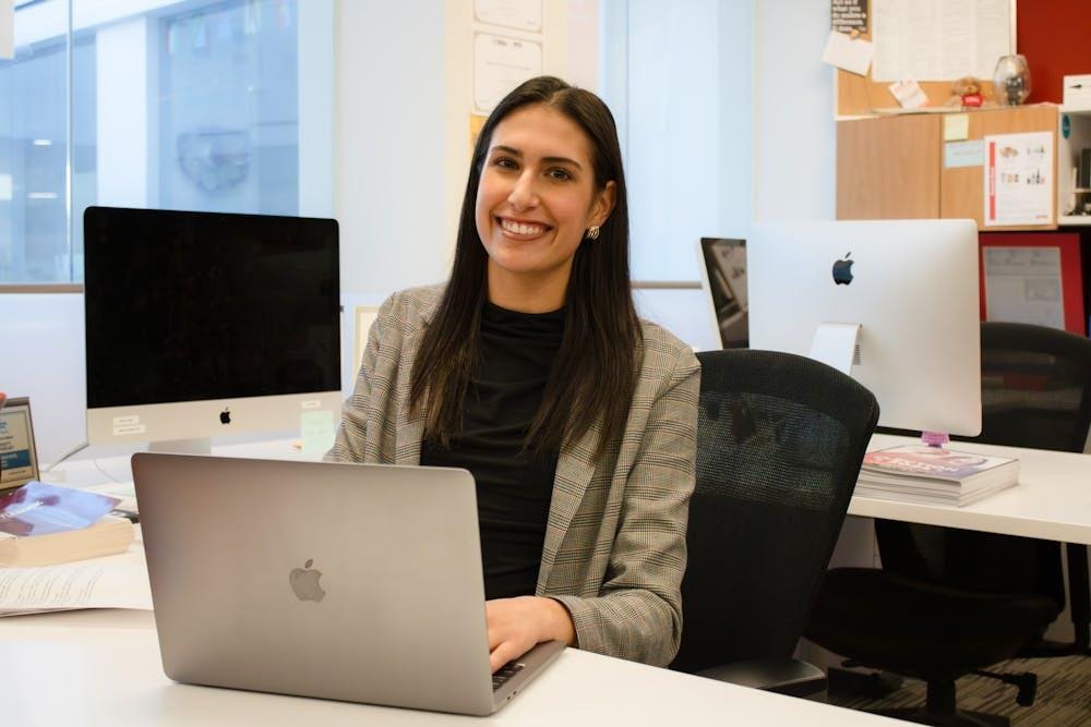 Olivia Patel sits at her desk in The Miami Student's newsroom.