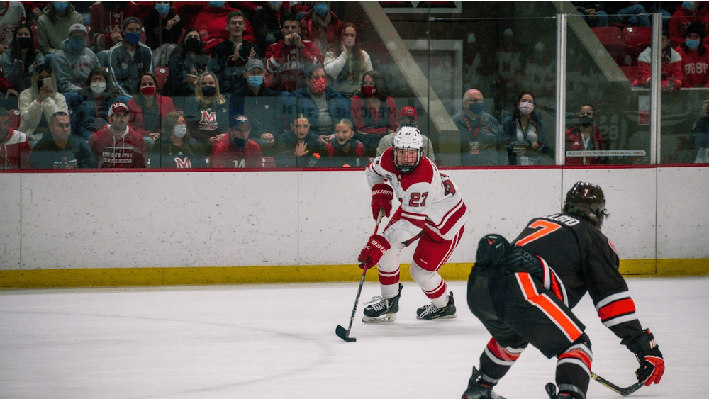 Sophomore defenseman Dylan Moulton controls the puck in Miami&#x27;s Oct. 22 tie vs. Bowling Green