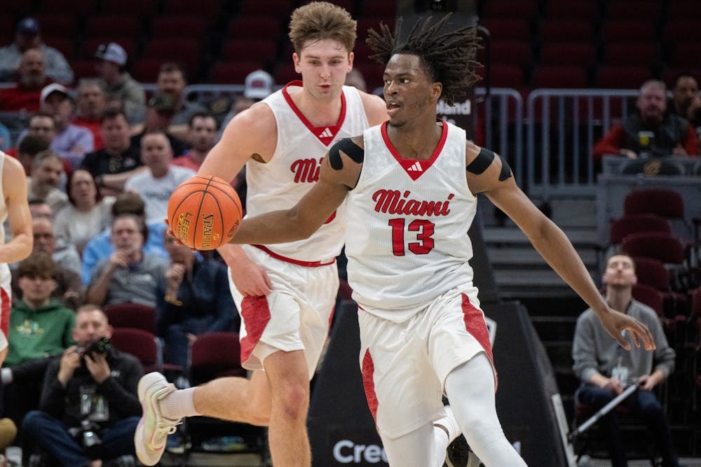 Antwone Woolfolk dribbles down the court against Eastern Michigan on March 13 at the MAC tournament
