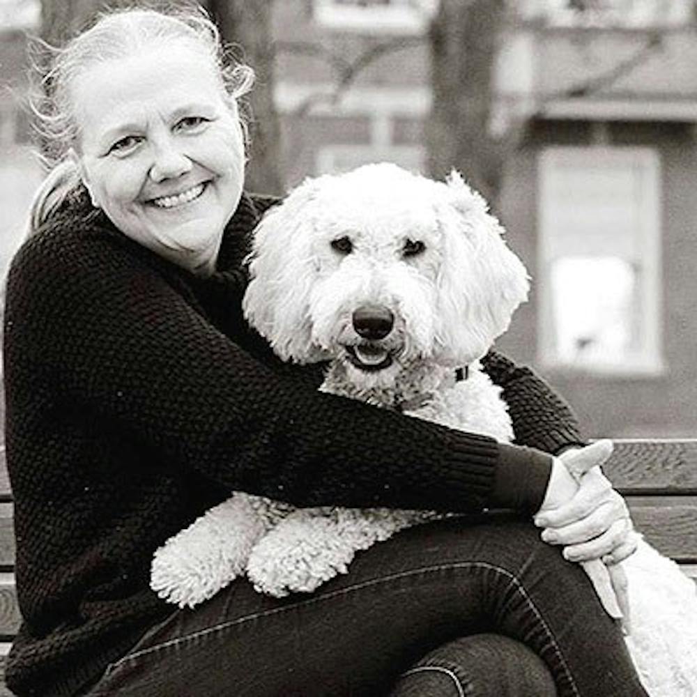 Cheryl Heckler with her golden doodle, Pip.