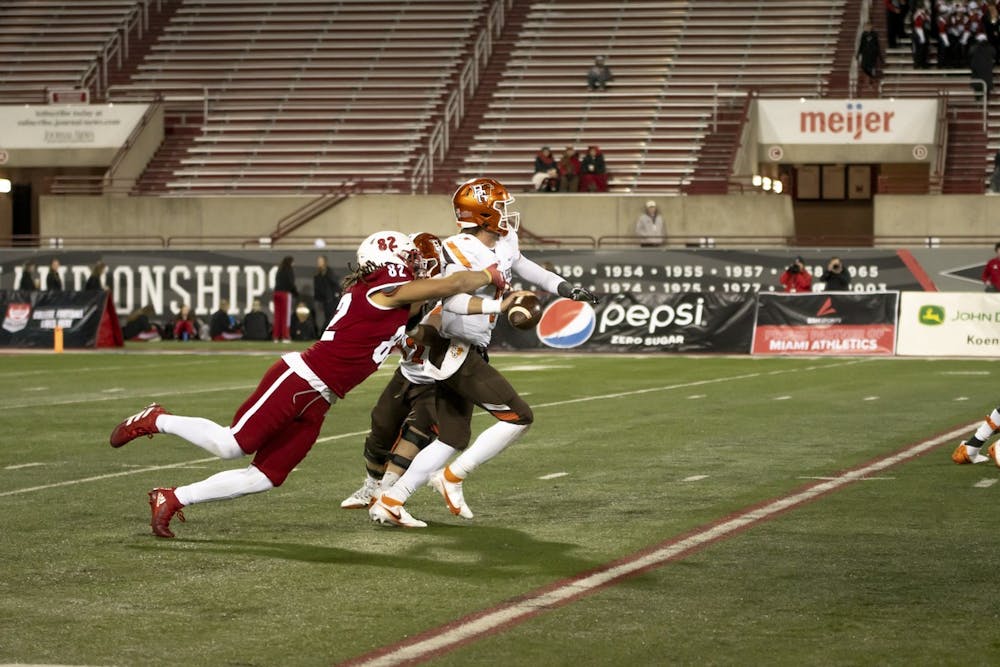 Redshirt junior defensive end Kameron Butler gets a sack on Bowling Green quarterback Matt McDonald to force a fumble in a Nov. 16 34-7 win over the Falcons. Linebacker Matthew Salopek recovered the fumble, which led to a Miami touchdown.