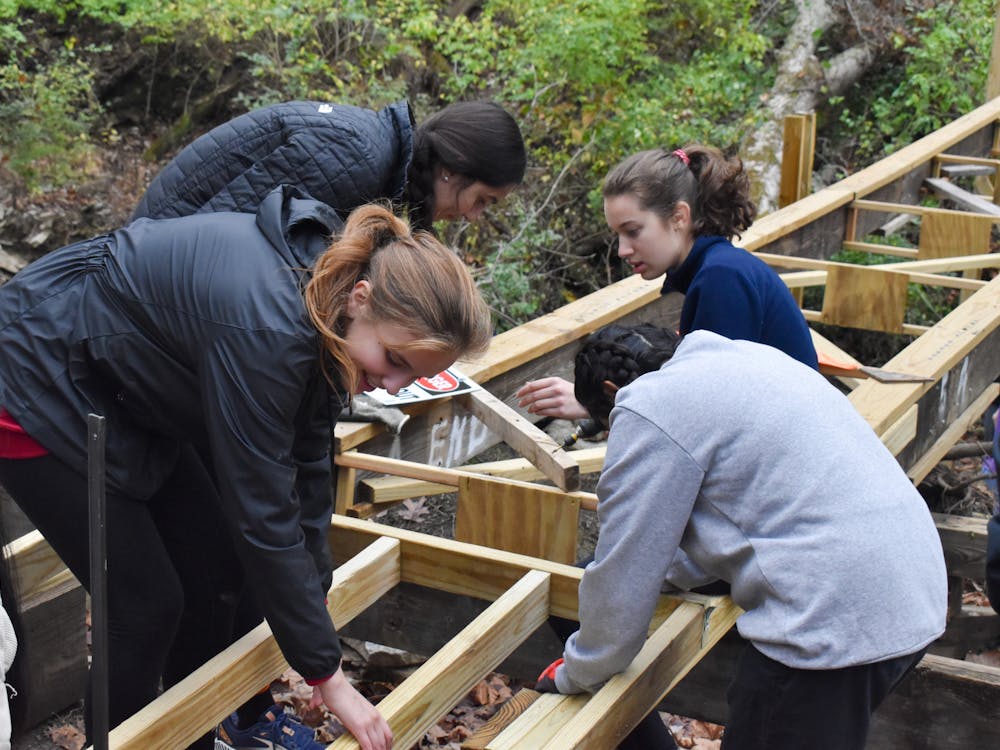 Author Parker Green and other Engineers Without Borders attempt to build a sleigh with little to no instruction. Photo provided by Brooklyn Lengyel