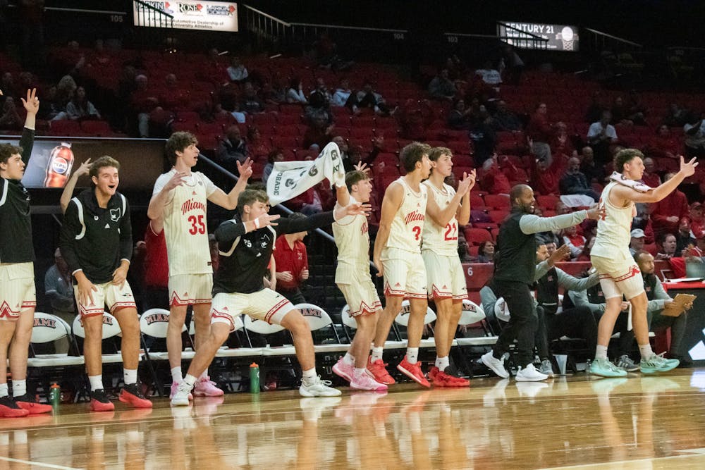 Miami men's basketball's bench celebrating against Maryland Eastern Shore on Nov. 12