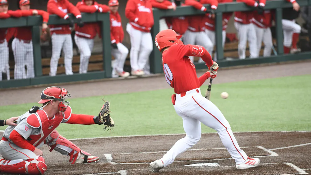 Senior infielder Dominic Krupinski swings at a pitch in game against the University of Dayton Flyers on March 18.