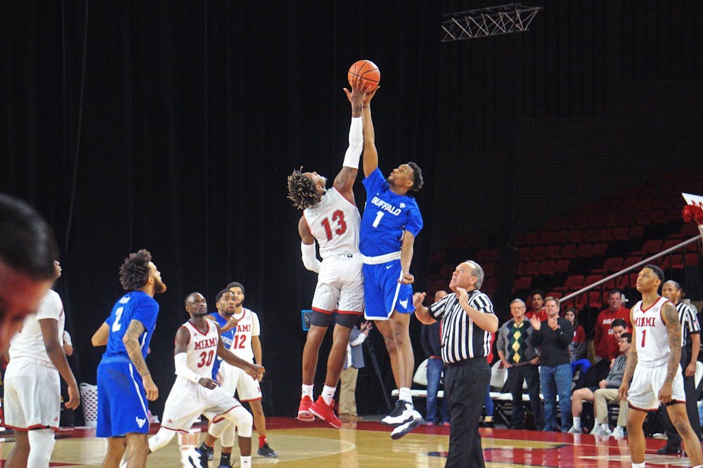 Dalonte Brown attempts to win a tipoff against Buffalo&#x27;s Montrell McRae on March 1 at Millett Hall.