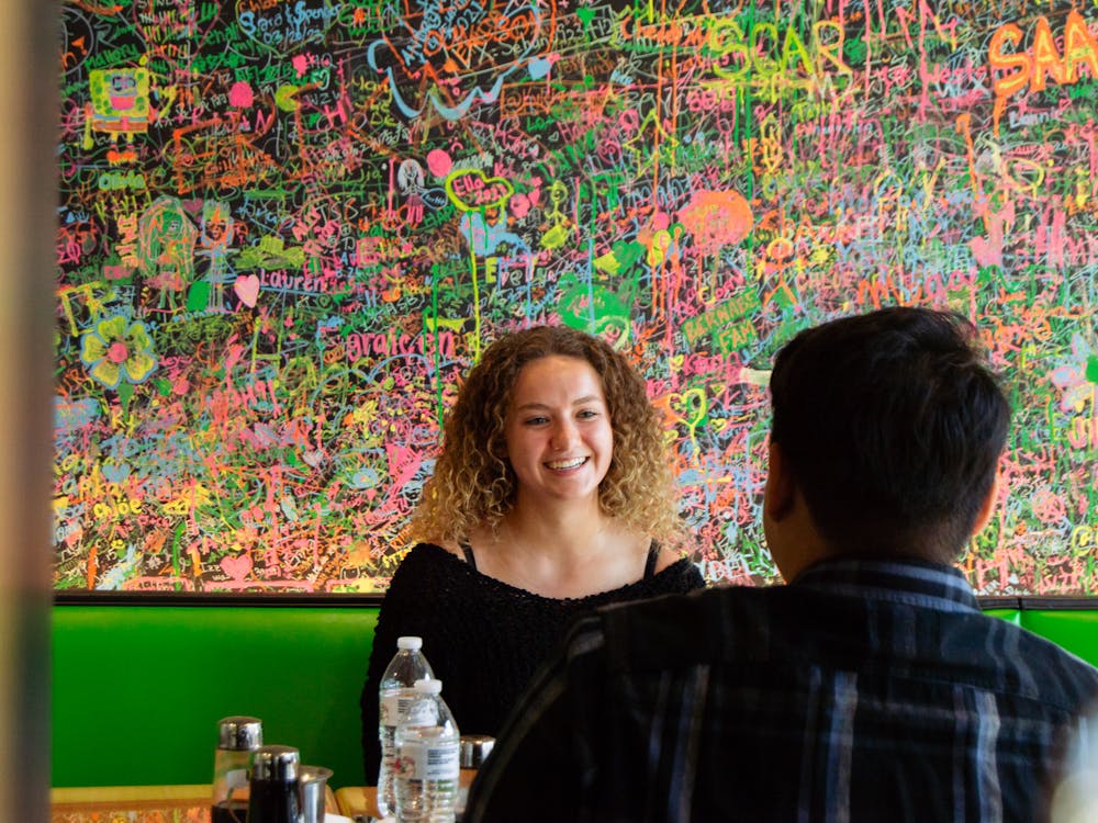 Tommy and Gina shared crab rangoons and talked about their passions.